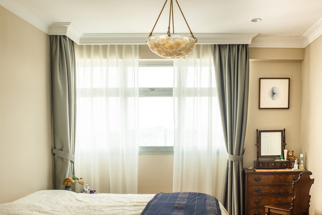 Modern Rustic bedroom with day and night drapes installed