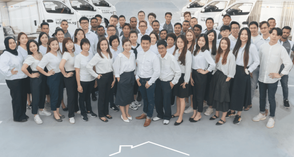 The Curtain Boutique team standing together in celebration of being awarded as a 2025 Company of Good in Singapore.