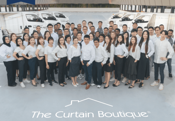 The Curtain Boutique team standing together in celebration of being awarded as a 2025 Company of Good in Singapore.