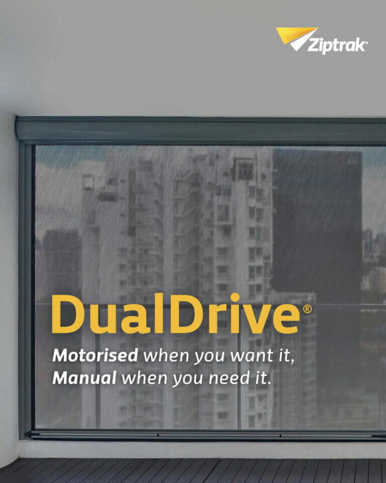 A close-up view of a Ziptrak outdoor balcony blind installed on a Singapore condo, demonstrating how the unique DualDrive system can be useful in the bad weather.