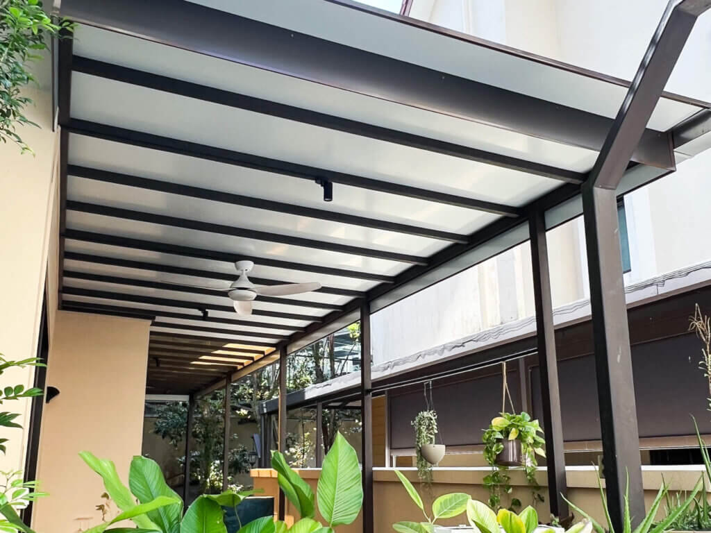 composite panel roofing installed at outdoor patio as shelter