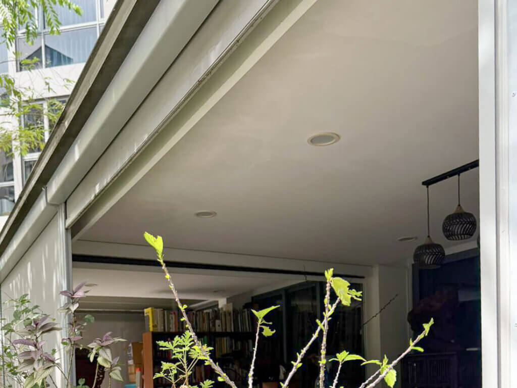 condominium balcony with white false ceiling board roof