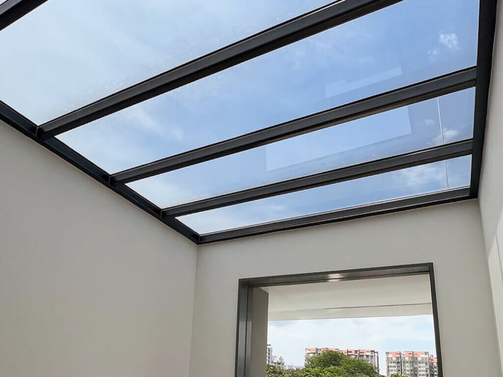 landed property with clear glass roofing landed black galvanised steel frame