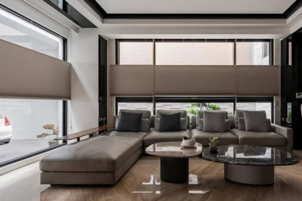 Grey honeycomb blinds with top down bottom up function in a landed home