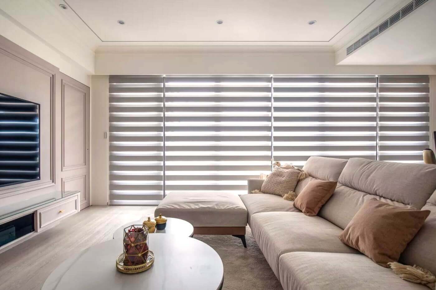 grey combi blinds on large windows in a modern living room